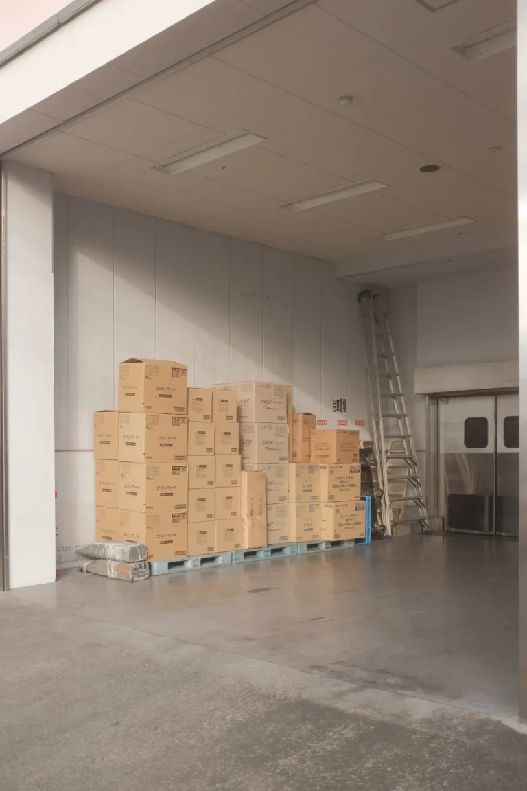 Boxes in an empty room